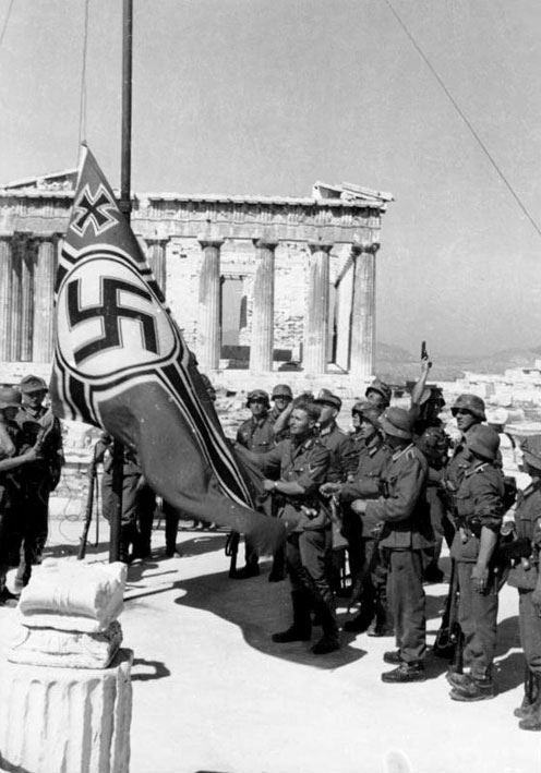 Nazi soldiers raising the Nazi War Flag over the Acropolis.